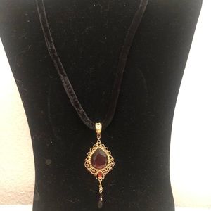 Medallion on velvet cord necklace Avon 12”
